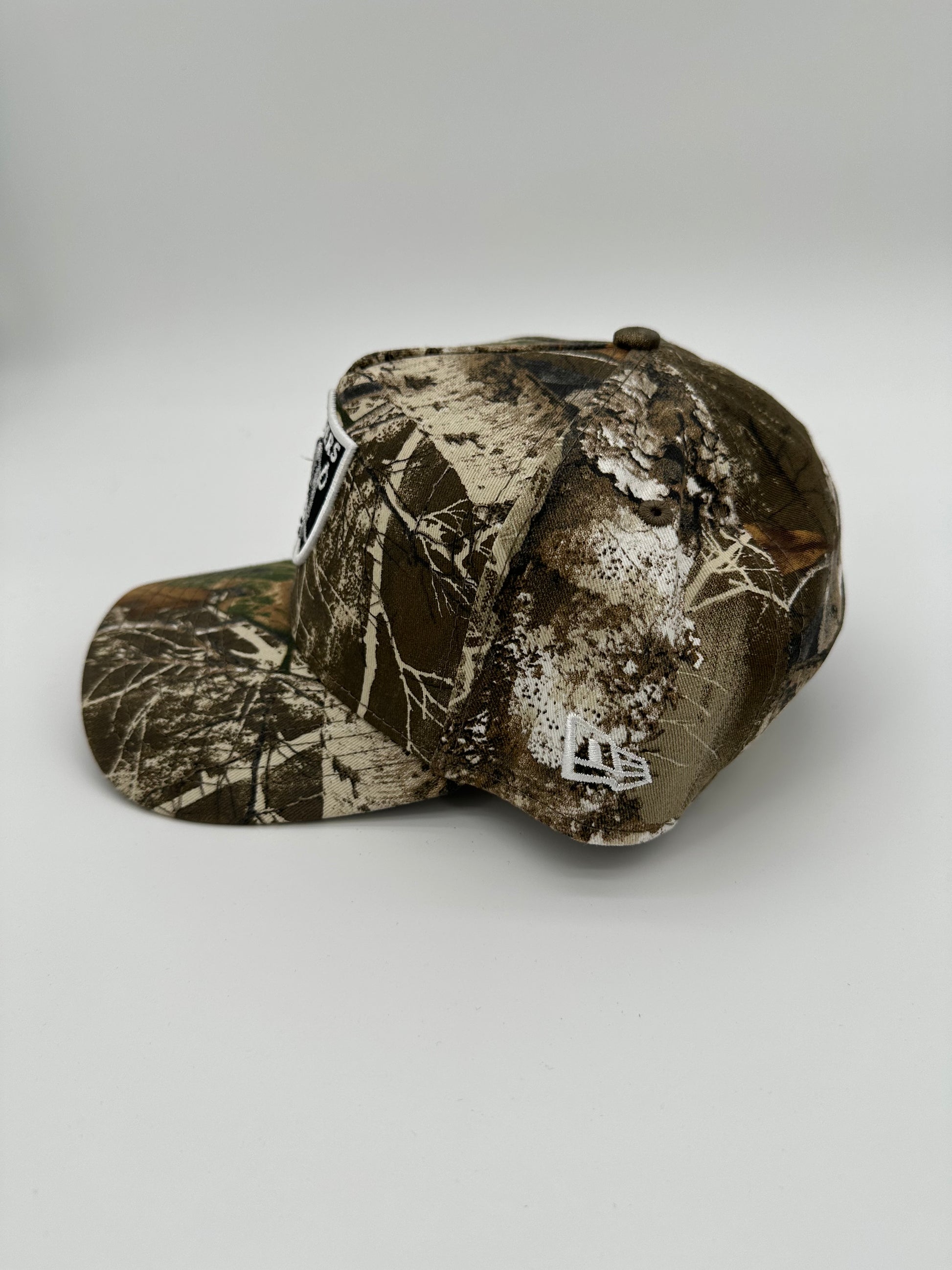 New Era Camo Raiders Snapback